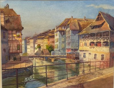 a watercolor painting of a town by the water