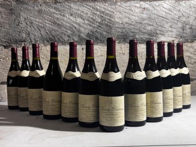 many bottles of wine lined up on a table