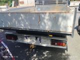 a white truck that is parked on the street