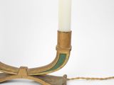 an image of a candle holder with a rope attached to it