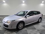 a picture of a silver car parked in a garage