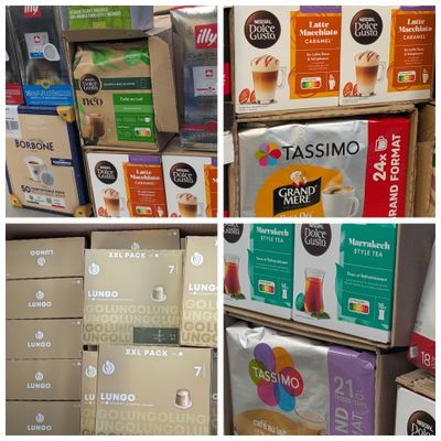 many boxes of coffee on the shelves in the store