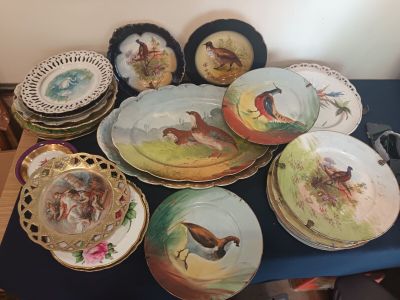 a lot of plates that are sitting on a table