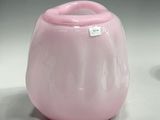 two pink vases sitting next to each other on a table