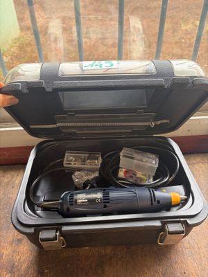 a tool in a case that is sitting on a table