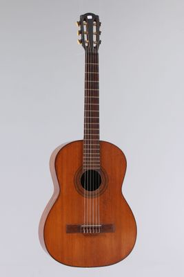 a close up of an acoustic guitar on a white background