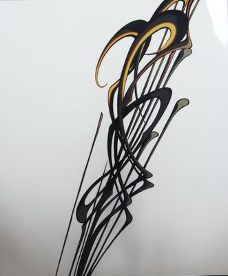 a metal sculpture of musical notes on a white wall