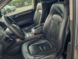 the interior of a car with two seats and a steering wheel