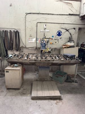 an image of a workbench in a workshop with tools