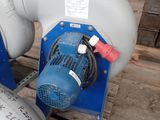 two air compressors sitting on a pallet in a warehouse