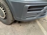 a close up of the front bumper of a car