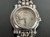 an image of a close up of a wrist watch on a table