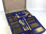 a blue case with silverware in it on a table