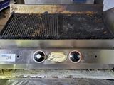 an image of a grill with a lot of burners on it