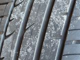 the tire of a car is covered in snow and ice