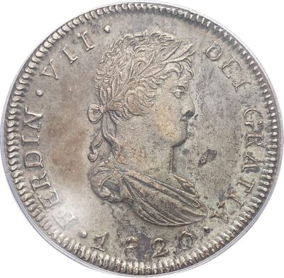 a close up of a silver coin with a woman ' s head on it