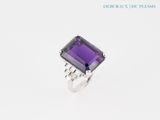 an amethorate and diamond ring set in 18k white gold