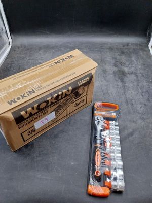 a box of toothpaste next to a package of toothpaste
