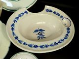 a bowl, plate, and bowl set on a table