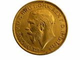 l'image d'une pièce d'or sur laquelle figure le visage d'un homme