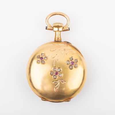 an image of a gold pocket watch with pink and white stones