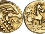 a gold coin with an image of a horse on it