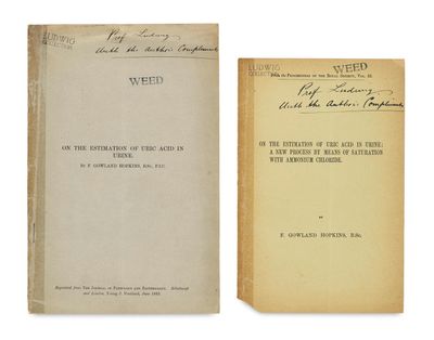 a book with two pages of writing on it and an old book with writing on it