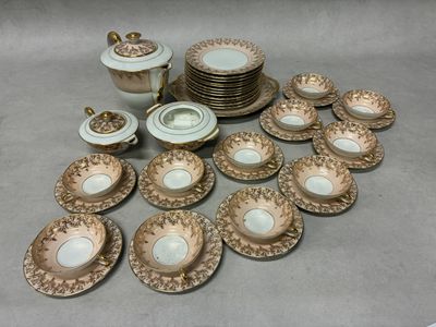 many plates and cups that are sitting on a table