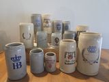 many different types of mugs on the table