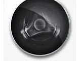 a close up of a washing machine with the door open
