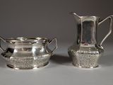 pair of silverplated sugar and creamers