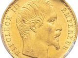 a close up of a gold coin with a woman ' s face on it