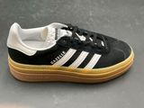 a close up of a pair of black and white shoes