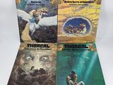 three books of thorgal and other fantasy novels on a white background