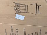 cardboard box with a picture of a bird in a cage on top of it