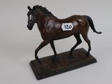 a statue of a horse with a number on it