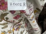 a close up of a purse with a label on it