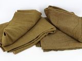 three pieces of brown fabric folded on top of each other
