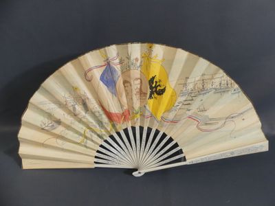an old fan with a painting on it on a black background
