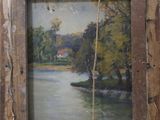 an old picture frame with a painting of a river in it