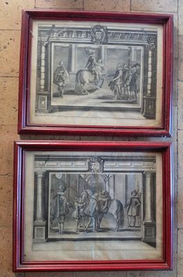 deux tableaux encadrés accrochés au mur d'une pièce