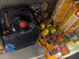 a lot of toys on the shelf in the store