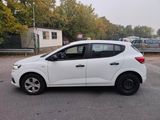 a white car that is parked in a parking lot