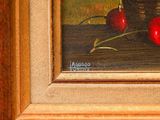 a painting of cherries in a wicker basket on a table