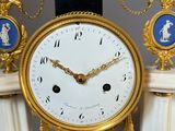 a clock that is sitting on top of a table
