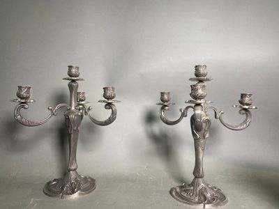 pair of antique silver plated candelabs on stands