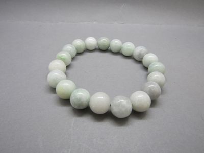 Bracelet élastique de boules de jade (10,30 mm).