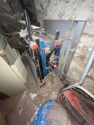 an image of a room that has a water heater in it