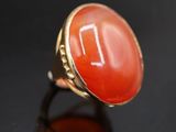 une image représentant une bague sertie d'une pierre de cornaline