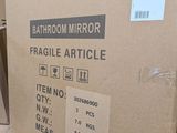 many boxes stacked on top of each other in a room